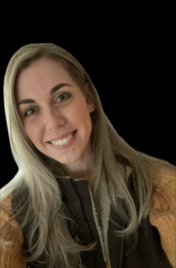 Nicole Harstad's portrait shows her smiling face and long medium-blonde straight hair.